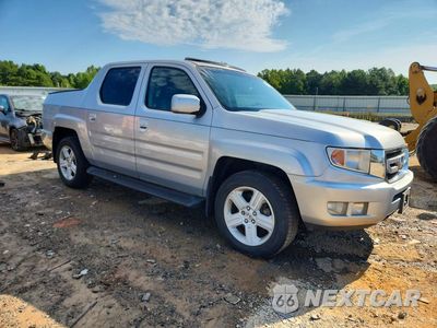 Czwarte zdjęcie samochodu z boku: 2010 HONDA RIDGELINE RTL VIN:5FPYK1F57AB011657 - miniatura