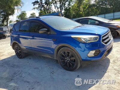 Czwarte zdjęcie samochodu z boku: 2017 FORD ESCAPE SE VIN:1FMCU0G96HUB59479 - miniatura
