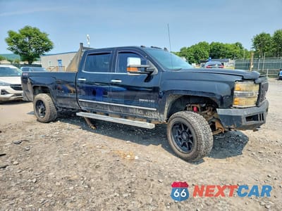 Czwarte zdjęcie samochodu z boku: 2015 CHEVROLET SILVERADO K2500 HEAVY DUTY LTZ VIN:1GC1KWEG2FF547011 - miniatura