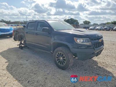 Czwarte zdjęcie samochodu z boku: 2018 CHEVROLET COLORADO ZR2 VIN:1GCGTEEN3J1125299 - miniatura