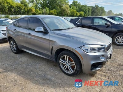 Czwarte zdjęcie samochodu z boku: 2017 BMW X6 XDRIVE50I VIN:5UXKU6C32H0S99779 - miniatura