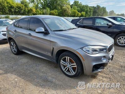 Czwarte zdjęcie samochodu z boku: 2017 BMW X6 XDRIVE50I VIN:5UXKU6C32H0S99779 - miniatura