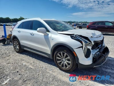 Czwarte zdjęcie samochodu z boku: 2019 CADILLAC XT4 PREMIUM LUXURY VIN:1GYFZDR46KF109909 - miniatura