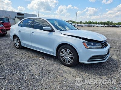 Czwarte zdjęcie samochodu z boku: 2017 VOLKSWAGEN JETTA S VIN:3VW2B7AJ4HM405853 - miniatura