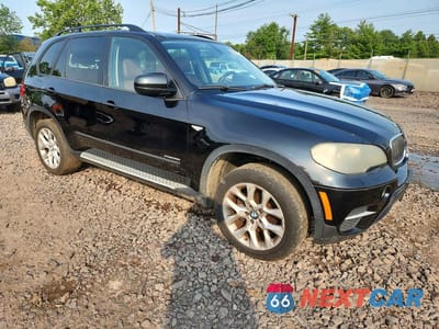 Czwarte zdjęcie samochodu z boku: 2011 BMW X5 XDRIVE35I VIN:5UXZV4C58BL408463 - miniatura