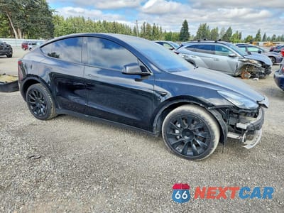 Czwarte zdjęcie samochodu z boku: 2022 TESLA MODEL Y VIN:7SAYGDEE9NF481923 - miniatura