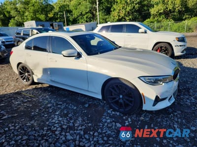 Czwarte zdjęcie samochodu z boku: 2021 BMW 330XI VIN:3MW5R7J01M8B81539 - miniatura