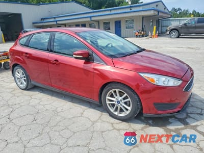 Czwarte zdjęcie samochodu z boku: 2015 FORD FOCUS SE VIN:1FADP3K21FL372005 - miniatura