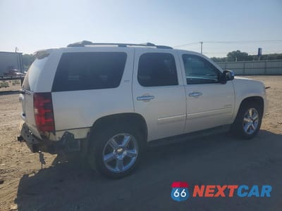 Trzecie zdjęcie samochodu z tyłu: 2012 CHEVROLET TAHOE C1500 LTZ VIN:1GNSCCE09CR122762 - miniatura