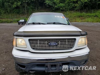 Piąte zdjęcie samochodu w środku: 2001 FORD F150 VIN:1FTRW08L21KE75157 - miniatura