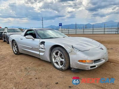 Czwarte zdjęcie samochodu z boku: 2001 CHEVROLET CORVETTE VIN:1G1YY22G815124807 - miniatura