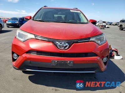Piąte zdjęcie samochodu w środku: 2016 TOYOTA RAV4 XLE VIN:2T3RFREV4GW441540 - miniatura
