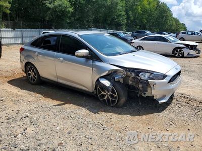 Czwarte zdjęcie samochodu z boku: 2017 FORD FOCUS SEL VIN:1FADP3H29HL252172 - miniatura