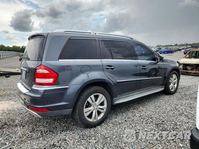 Trzecie zdjęcie samochodu z tyłu: 2011 MERCEDES-BENZ GL 450 4MATIC VIN:4JGBF7BEXBA685822 - miniatura
