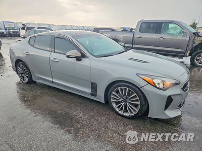 Czwarte zdjęcie samochodu z boku: 2021 KIA STINGER GT-LINE VIN:KNAE15LA6M6097208 - miniatura