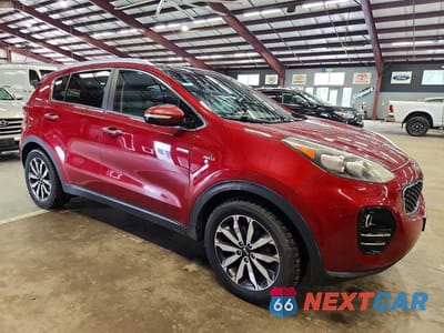 Czwarte zdjęcie samochodu z boku: 2017 KIA SPORTAGE EX VIN:KNDPNCAC0H7057120 - miniatura