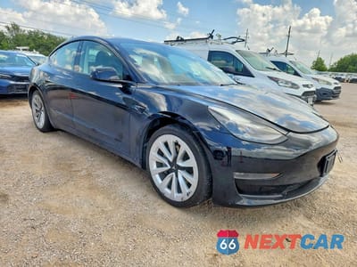 Czwarte zdjęcie samochodu z boku: 2022 TESLA MODEL 3 VIN:5YJ3E1EA7NF187719 - miniatura