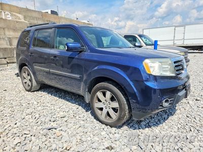 Czwarte zdjęcie samochodu z boku: 2014 HONDA PILOT TOURING VIN:5FNYF4H99EB042025 - miniatura