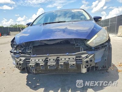 Piąte zdjęcie samochodu w środku: 2017 FORD FOCUS SEL VIN:1FADP3M25HL327326 - miniatura