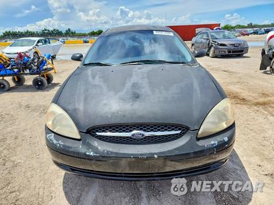 Piąte zdjęcie samochodu w środku: 2000 FORD TAURUS LX VIN:1FAFP5223YG155202 - miniatura