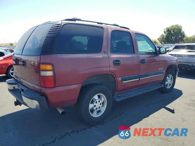 Trzecie zdjęcie samochodu z tyłu: 2001 CHEVROLET TAHOE C1500 VIN:1GNEC13T01J183704 - miniatura