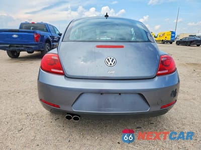 Zdjęcie 6 z 12 samochodu: 2013 VOLKSWAGEN BEETLE VIN:3VWJL7AT3DM669330 - miniatura