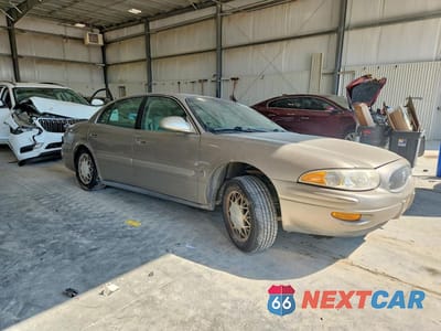 Czwarte zdjęcie samochodu z boku: 2000 BUICK LESABRE LIMITED VIN:1G4HR54K1YU256763 - miniatura