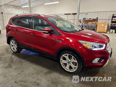 Czwarte zdjęcie samochodu z boku: 2019 FORD ESCAPE TITANIUM VIN:1FMCU9J97KUA47150 - miniatura