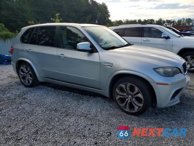 Czwarte zdjęcie samochodu z boku: 2010 BMW X5 M VIN:5YMGY0C58ALK25448 - miniatura