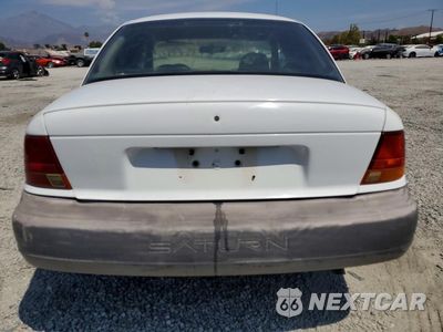 Zdjęcie 6 z 12 samochodu: 1996 SATURN SL1 VIN:1G8ZH5284TZ357899 - miniatura