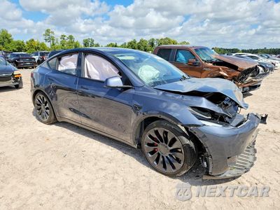 Czwarte zdjęcie samochodu z boku: 2023 TESLA MODEL Y VIN:7SAYGDEF6PF766381 - miniatura