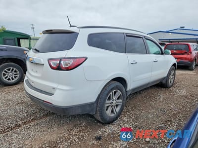 Trzecie zdjęcie samochodu z tyłu: 2017 CHEVROLET TRAVERSE LT VIN:1GNKVGKD1HJ292063 - miniatura