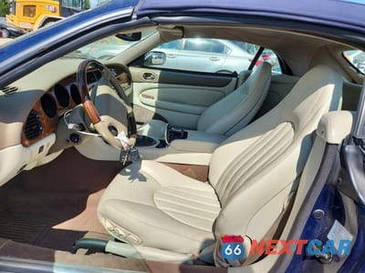 Zdjęcie 7 z 12 samochodu: 2000 JAGUAR XK8 VIN:SAJJA42C5YNA10400 - miniatura