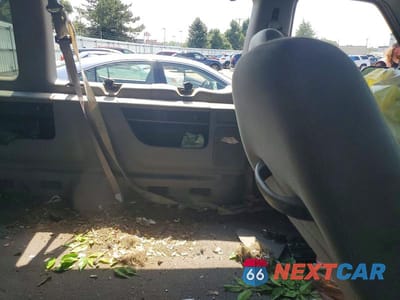 Zdjęcie 11 z 13 samochodu: 1999 FORD ECONOLINE E150 WAGON VIN:1FMRE11W6XHB57623 - miniatura