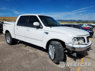 Czwarte zdjęcie samochodu z boku: 2003 FORD F150 SUPERCREW VIN:1FTRW08L93KB06380 - miniatura