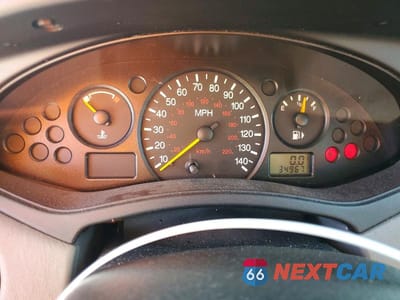Zdjęcie 9 z 12 samochodu: 2004 FORD FOCUS LX VIN:1FAFP33P24W197357 - miniatura