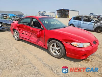 Czwarte zdjęcie samochodu z boku: 1999 PONTIAC GRAND PRIX GT VIN:1G2WP52K9XF222310 - miniatura