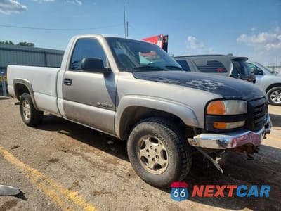 Czwarte zdjęcie samochodu z boku: 2004 CHEVROLET SILVERADO K1500 VIN:1GCEK14T54E109282 - miniatura