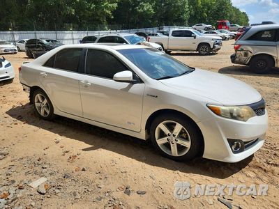 Czwarte zdjęcie samochodu z boku: 2014 TOYOTA CAMRY HYBRID SE VIN:4T1BD1FK7EU126265 - miniatura