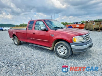 Czwarte zdjęcie samochodu z boku: 2002 FORD F150 VIN:1FTRX17L72NB26788 - miniatura
