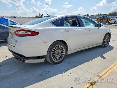 Trzecie zdjęcie samochodu z tyłu: 2014 FORD FUSION TITANIUM VIN:3FA6P0K97ER168832 - miniatura