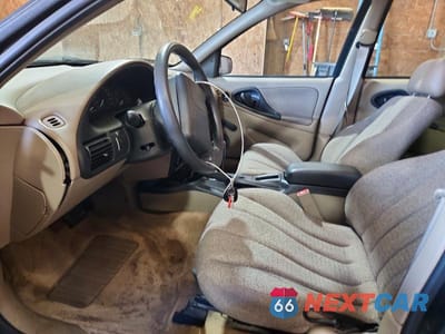 Zdjęcie 7 z 12 samochodu: 2002 CHEVROLET CAVALIER BASE VIN:1G1JC524327436918 - miniatura