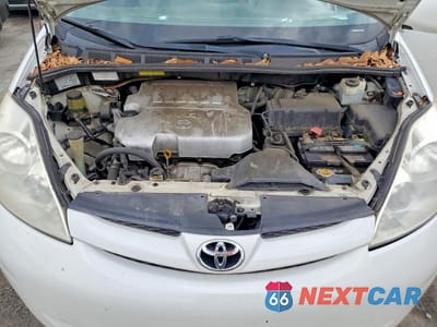 Zdjęcie 12 z 13 samochodu: 2010 TOYOTA SIENNA XLE VIN:5TDYK4CC5AS303560 - miniatura