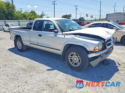 Czwarte zdjęcie samochodu z boku: 2002 DODGE DAKOTA SLT VIN:1B7GL42N42S500546 - miniatura