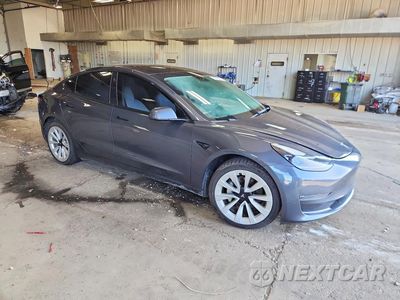 Czwarte zdjęcie samochodu z boku: 2023 TESLA MODEL 3 VIN:5YJ3E1EA1PF467705 - miniatura