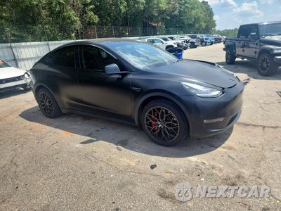 Czwarte zdjęcie samochodu z boku: 2022 TESLA MODEL Y VIN:7SAYGAEE5NF576526 - miniatura
