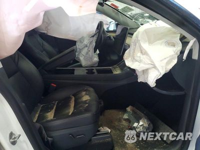 Zdjęcie 7 z 12 samochodu: 2023 TESLA MODEL Y VIN:7SAYGDEE3PA108389 - miniatura