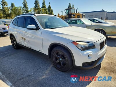 Czwarte zdjęcie samochodu z boku: 2013 BMW X1 SDRIVE28I VIN:WBAVM1C51DVW46211 - miniatura