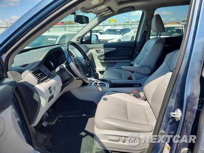 Zdjęcie 7 z 13 samochodu: 2017 HONDA PILOT EXL VIN:5FNYF5H51HB048215 - miniatura