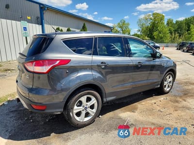 Trzecie zdjęcie samochodu z tyłu: 2016 FORD ESCAPE SE VIN:1FMCU9G93GUA07128 - miniatura